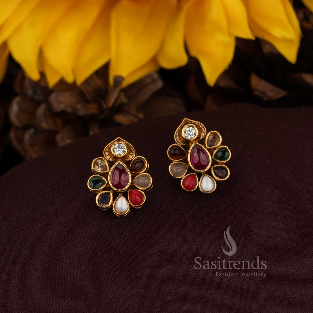 Celestial AD floral stud earrings with exquisite teardrop oval and round accents crafted in ornamental matte gold for noble weddings and resplendent jewellery traditions – Sasitrends