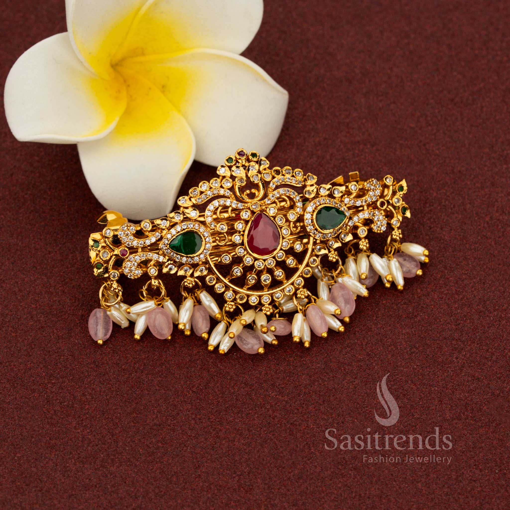 Grandiose pink matte gold hair clip adorned with ornate teardrop floral artistry majestic multi-color AD stones celestial pearl detailing and divine heritage refinement created for lavish wedding style – Sasitrends