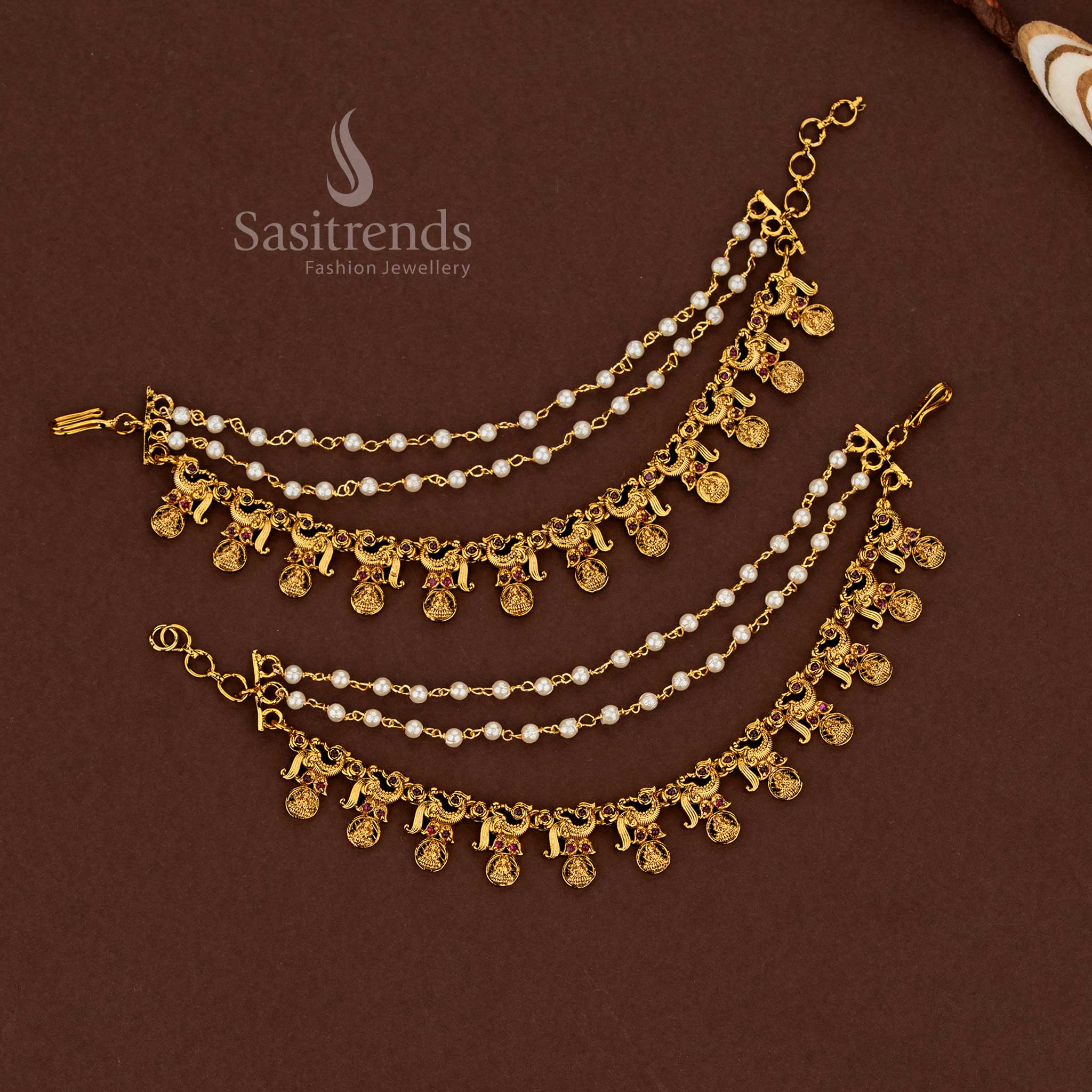 Kalyana inspired peacock Lakshmi temple matte gold plated American diamond matil ear chains glowing with ruby brilliance and delicate pearl accents for grand bridal attire - Sasitrends