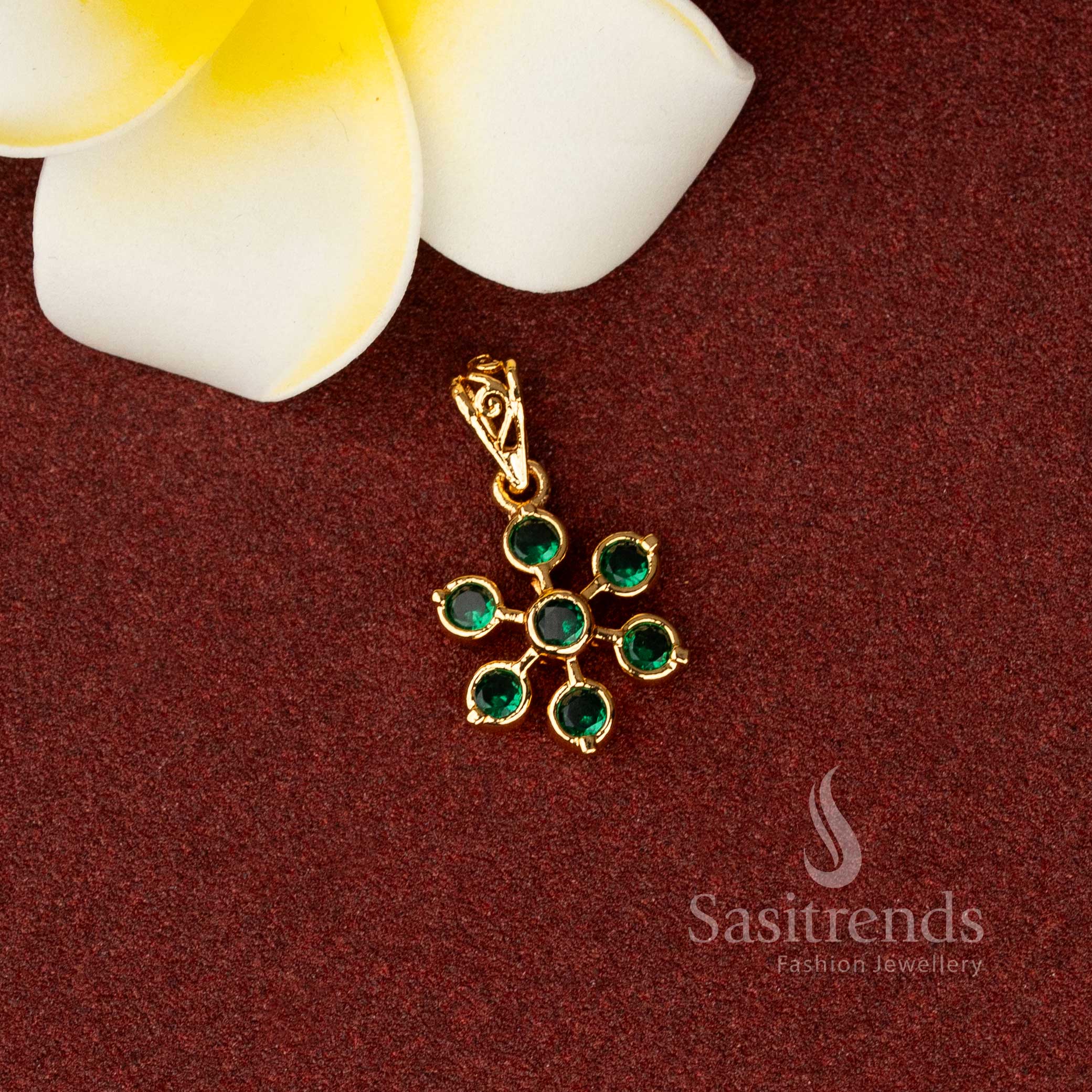 Striking Impon micro gold panchaloha floral pendant arranged with green stone clusters and festive AD illumination perfect for saree drapes and traditional gatherings – Sasitrends
