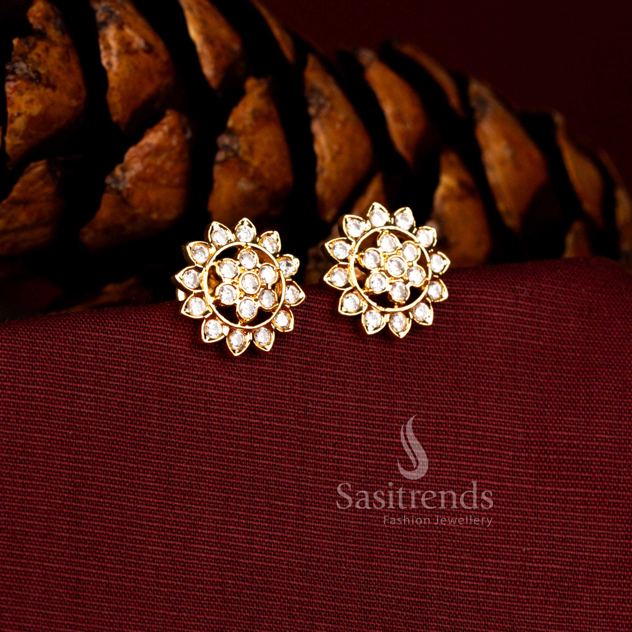Sacred Impon earrings in white crafted with brilliant AD stones and balanced dual floral stud formation – Sasitrends