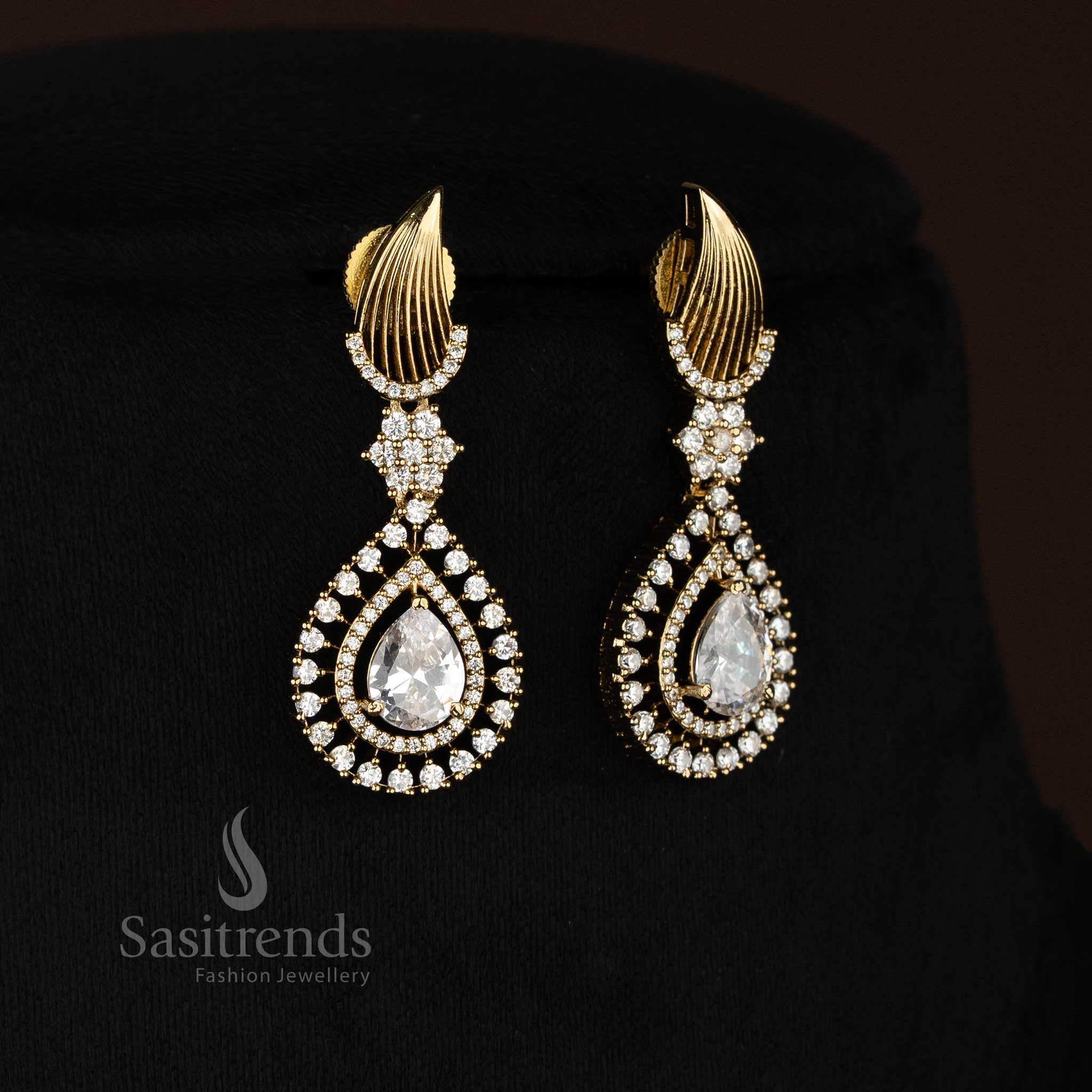 Frost Pebble mehendi gold white American Diamond teardrop stud earrings crafted for refined party wear and elegant festive styling – Sasitrends