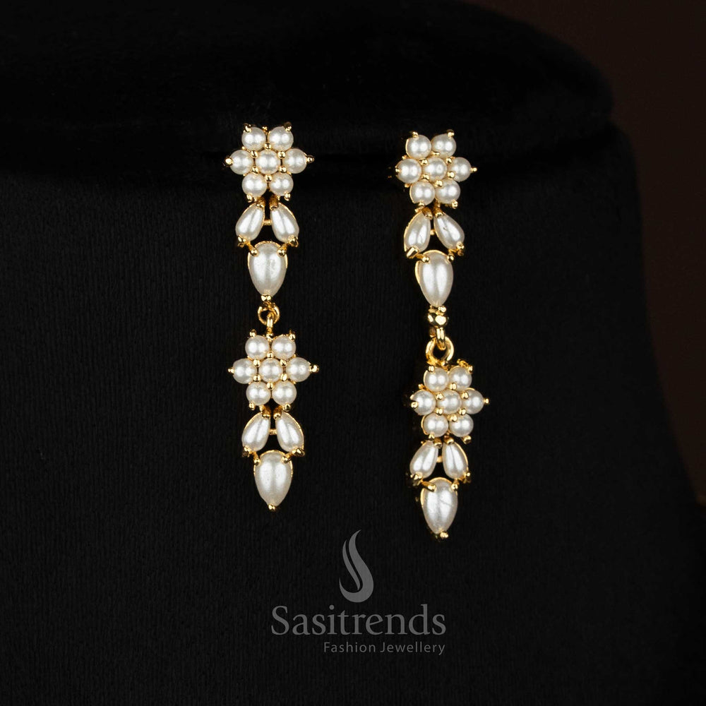 SilkGarden styled micro gold plated floral teardrop leaf AD pearl earrings suited for night styling events - Sasitrends