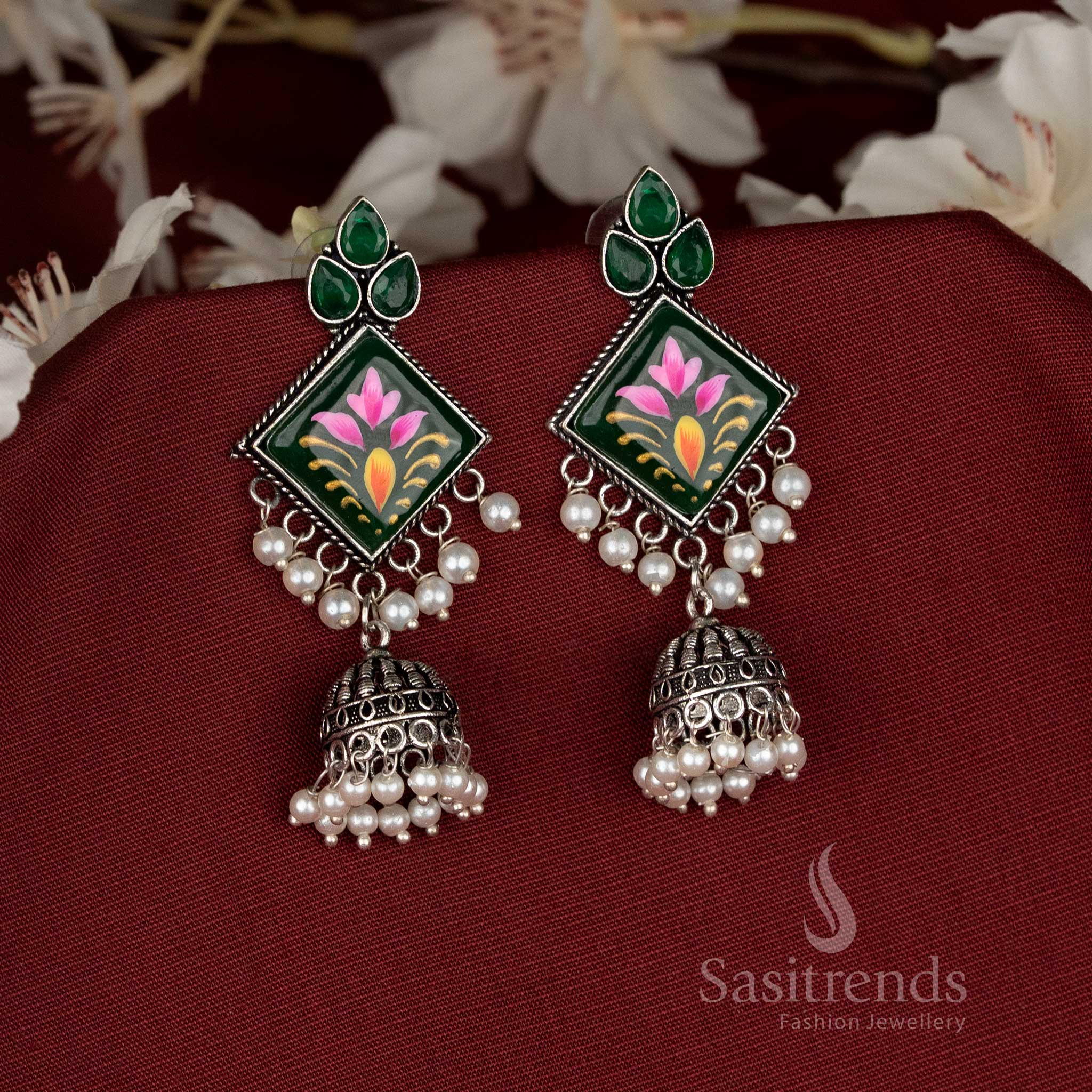 Oxidised green Monalisa stone diamond-cut jhumka earrings perfect for Navaratri celebrations with refreshing appeal – Sasitrends