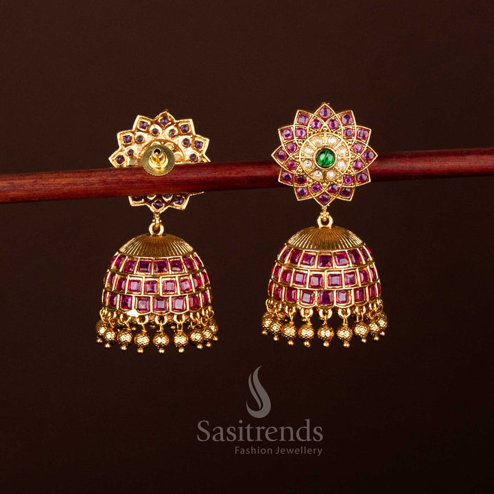 Majestic lotus glow matte gold plated temple jhumka earrings featuring intricate multi-stone work for festive elegance - Sasitrends