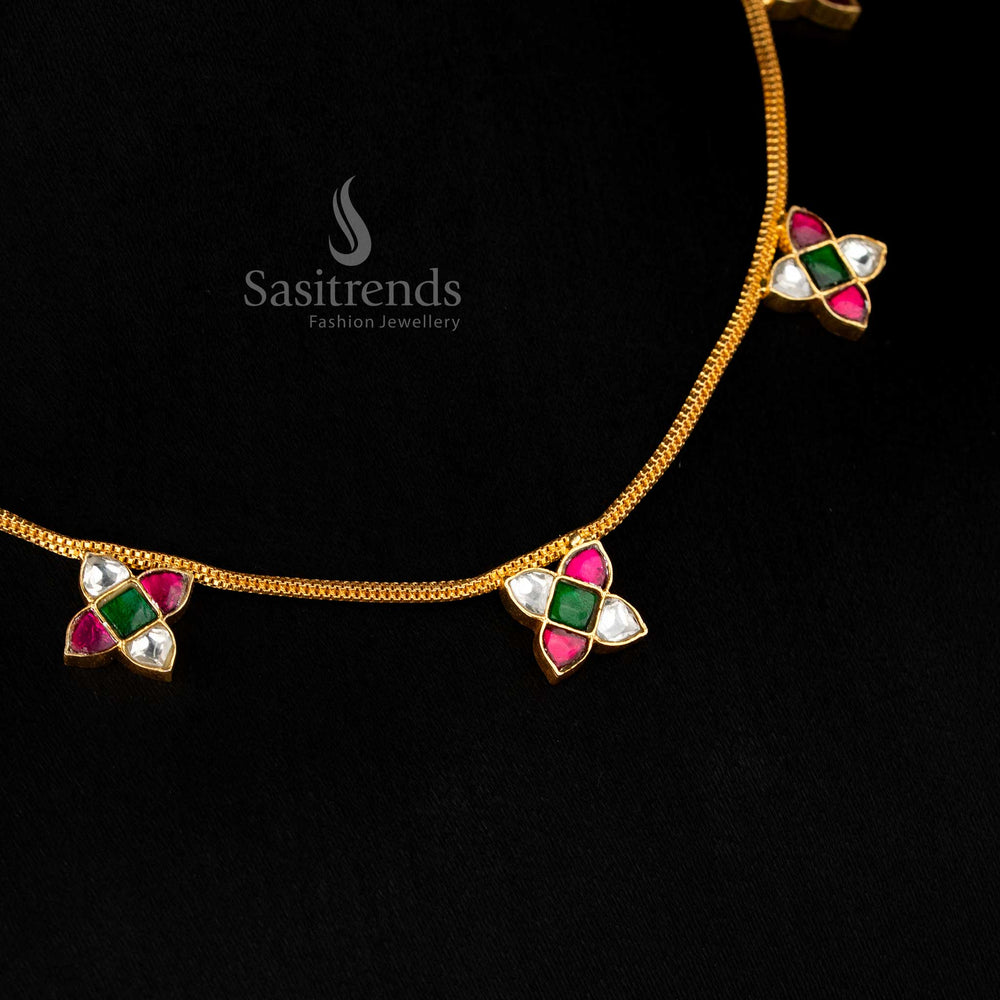 Opulent Jadau 24K gold plated necklace with delicate four-petal flower clusters and pearl danglers, designed for weddings and festive celebrations – Sasitrends
