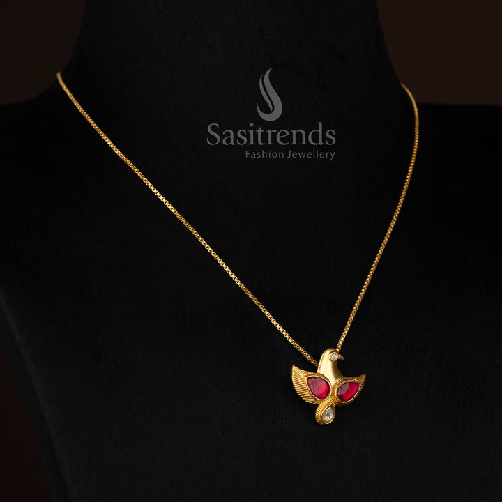 Opulent Jadau Kundan 24K gold plated ruby teen eagle pendant chain necklace suited for grand events and wedding festivities -Sasitrends