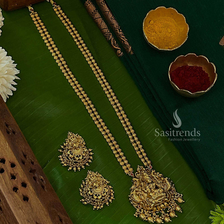 Royal ruby temple matte gold plated long jewellery set with two-layered beaded Lakshmi peacock pendant and ornate earrings, crafted for traditional women celebrating auspicious occasions – Sasitrends