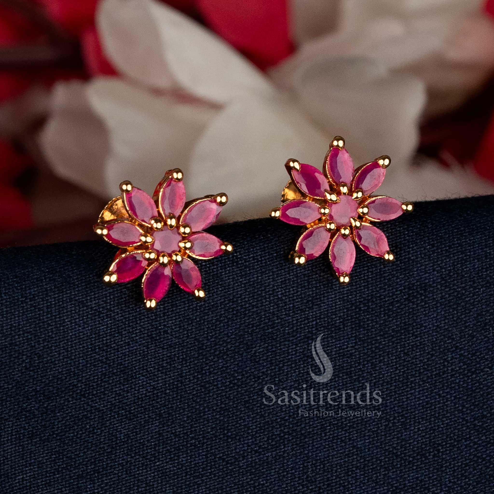 Elegant Micro Gold Plated Floral AD Stud Earrings with ruby tone gems, ideal for festive occasions, cultural gatherings, and traditional celebrations — Sasitrends