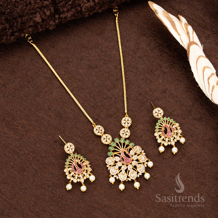 Designer temple-style matte gold plated peacock jewellery set AD stone studded with vibrant multi-gemstone embellishments, crafted to enhance women’s festive attire, ethnic weddings - Sasitrends