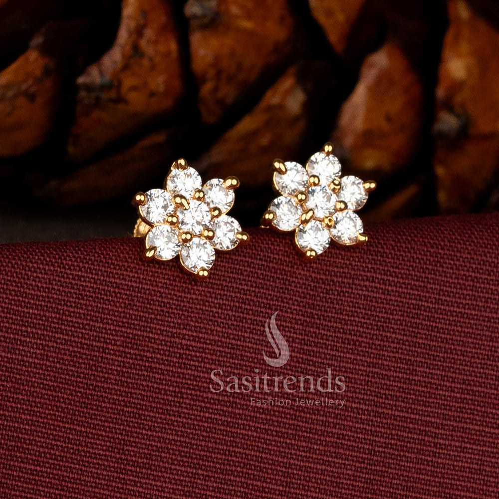 Opulent big earrings in white micro gold plated finish adorned with floral drop, textured leaf cluster, and gleaming American diamonds – Sasitrends