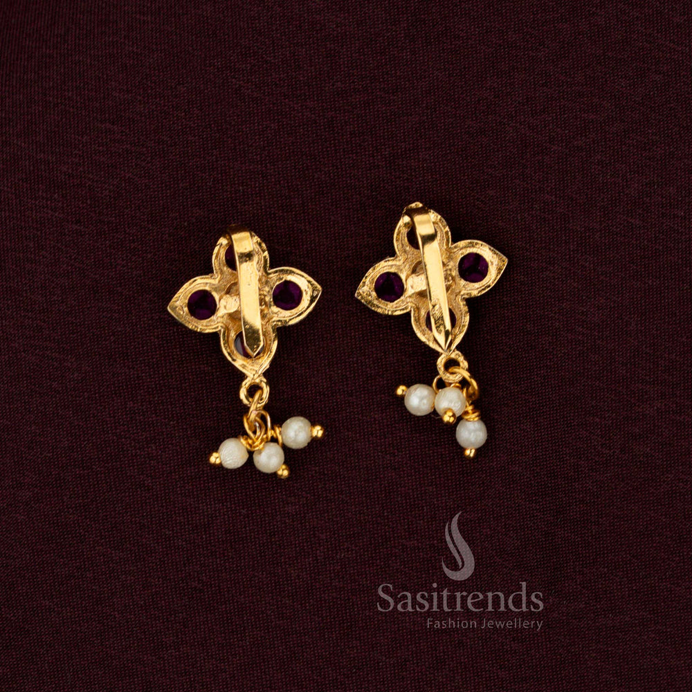 Handcrafted Ruby Green Jadau Bugadi Earrings Featuring Four Petal Floral Design Accented With Kundan And Pearls By Sasitrends