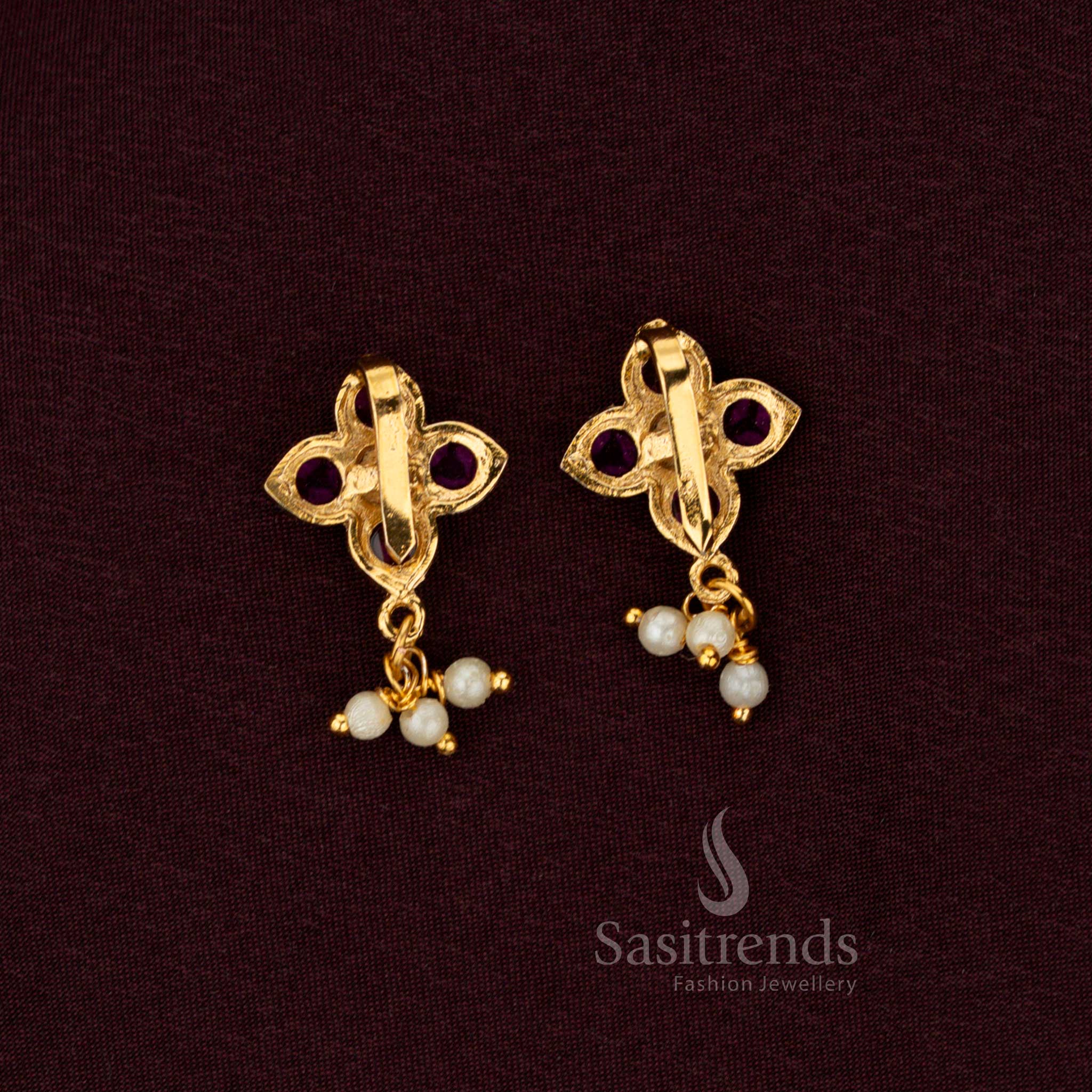 Handcrafted Ruby Green Jadau Bugadi Earrings Featuring Four Petal Floral Design Accented With Kundan And Pearls By Sasitrends
