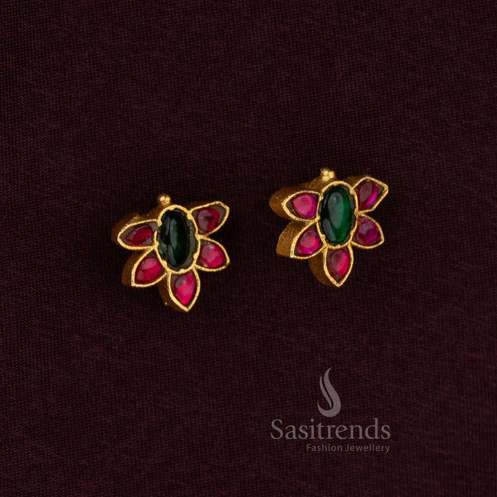 Designer ruby green Jadau Bugadi earrings with lotus inspired craftsmanship gold polish and Kundan accents - Sasitrends