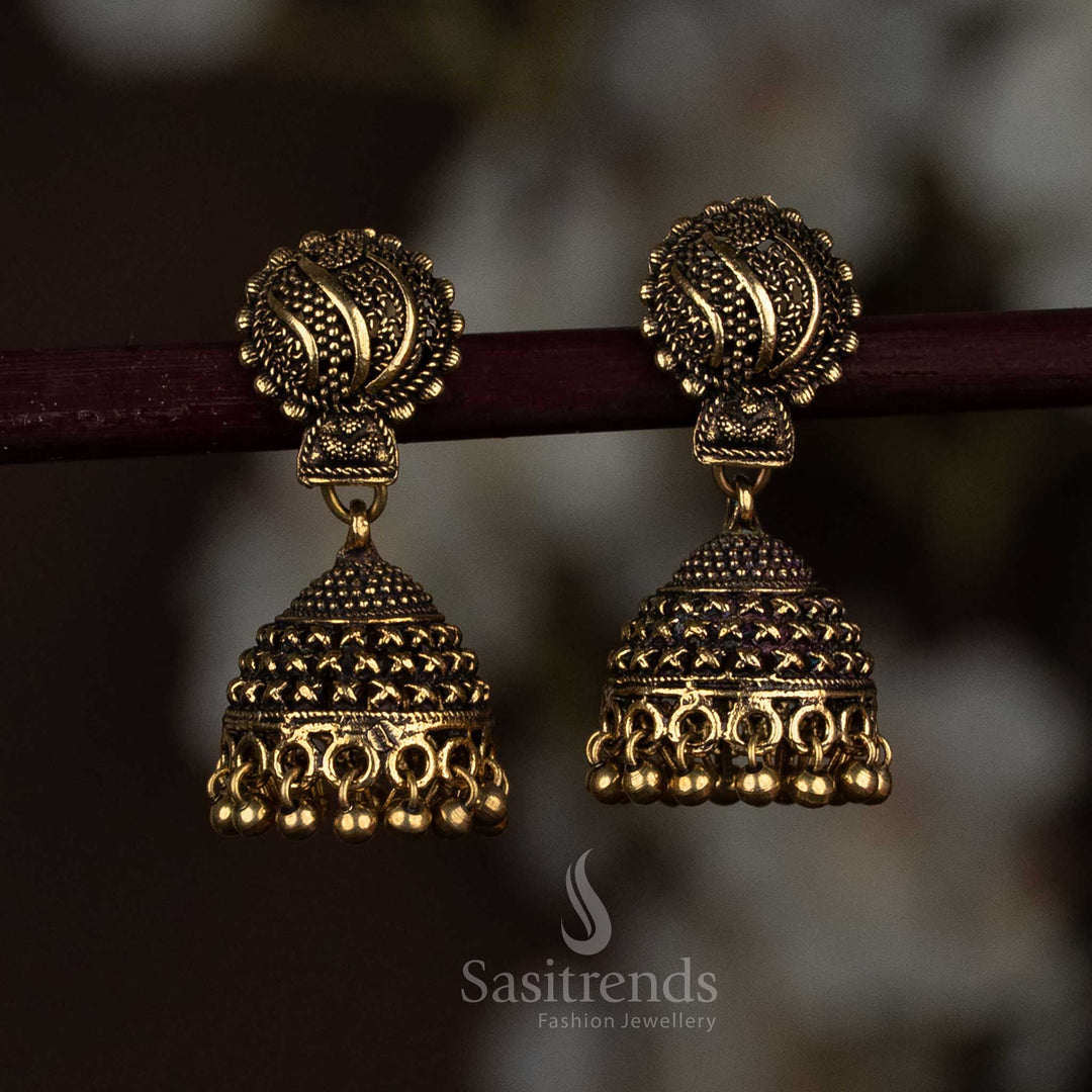 Gleaming Antique Gold Oxidised Dome Jhumka Earrings Featuring A Textured Surface And Sculpted Round Drop Finish, Designed For A Bold Yet Elegant Statement – Sasitrends
