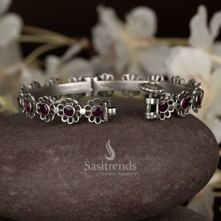 Luxurious antique oxidised kada bracelet with ruby stones and floral artistry, openable design ideal for stylish evening parties and cocktail celebrations – Sasitrends