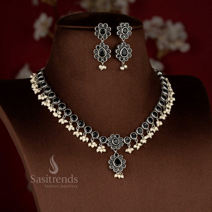 Bold black oxidised stone floral pearl drop necklace jewellery set finished in an antique structured style for statement saree dressing – Sasitrends