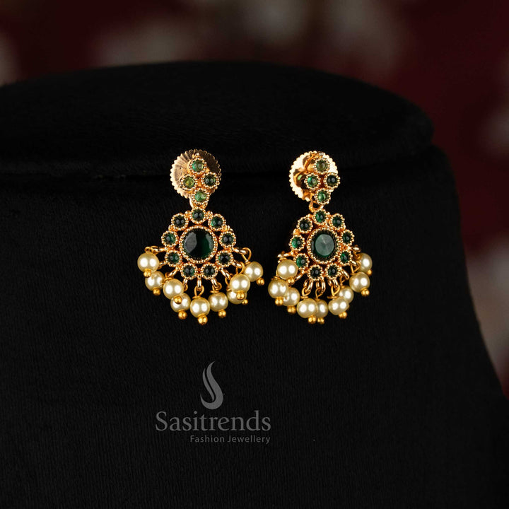 Vibrant green micro gold plated circular floral pearl earrings with sparkling American diamond accents, perfect jewellery for temple visits and ethnic saree styling - Sasitrends