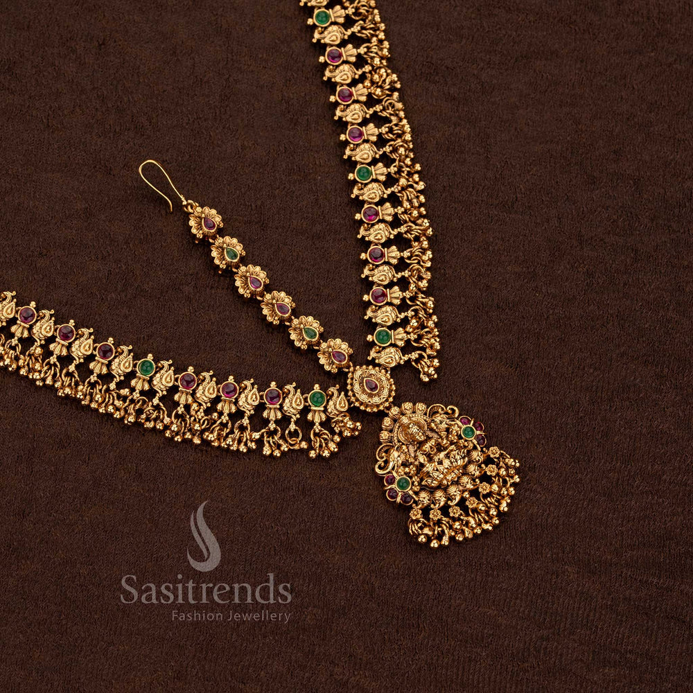 Opulent matte gold plated Lakshmi peacock three layer tikka for grand bridal ceremonies - Sasitrends