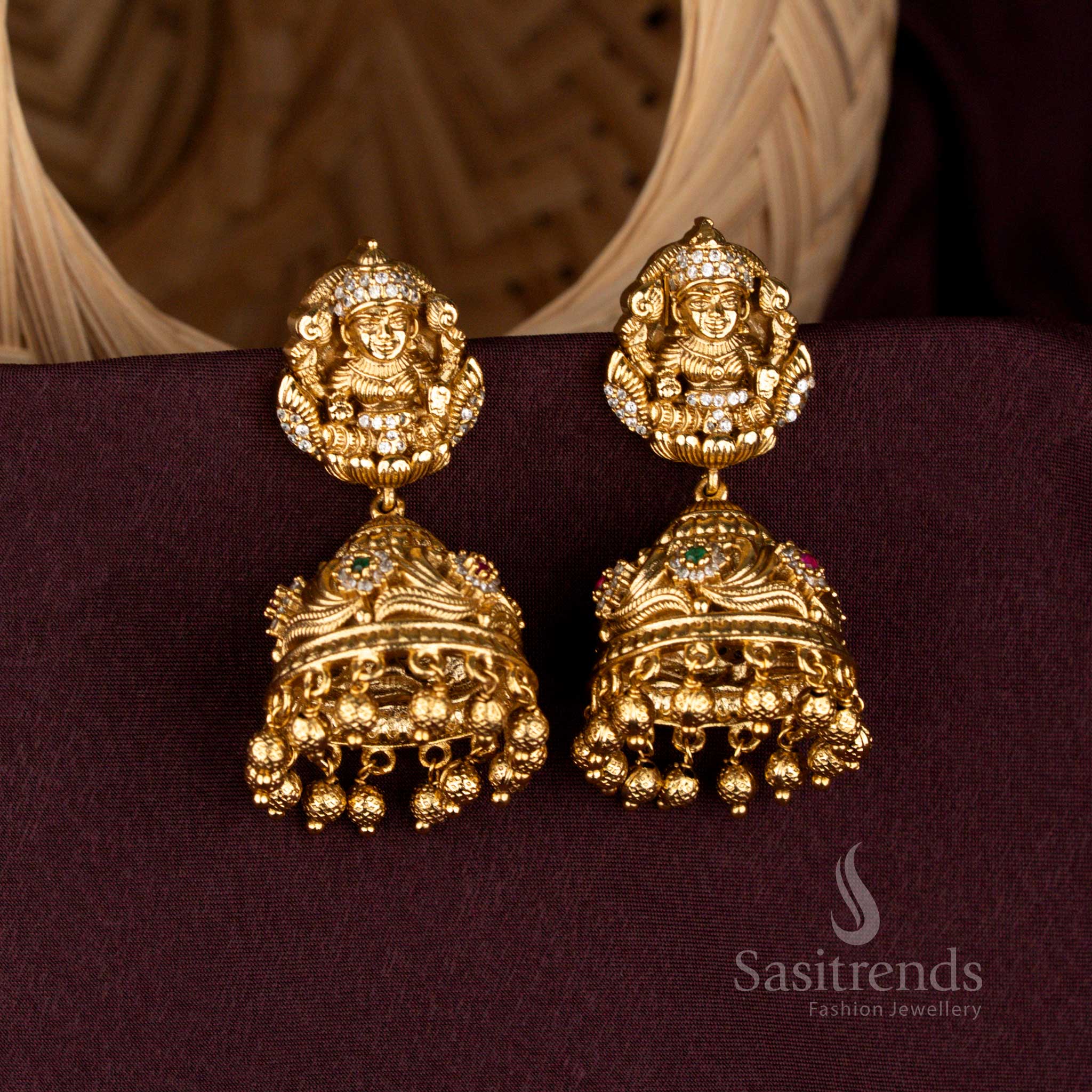 Eternal Lakshmi temple jhumka earrings crafted with carved domes, opulent bead danglers, grandiose matte gold artistry, aristocratic detailing, and heritage bridal refinement – Sasitrends