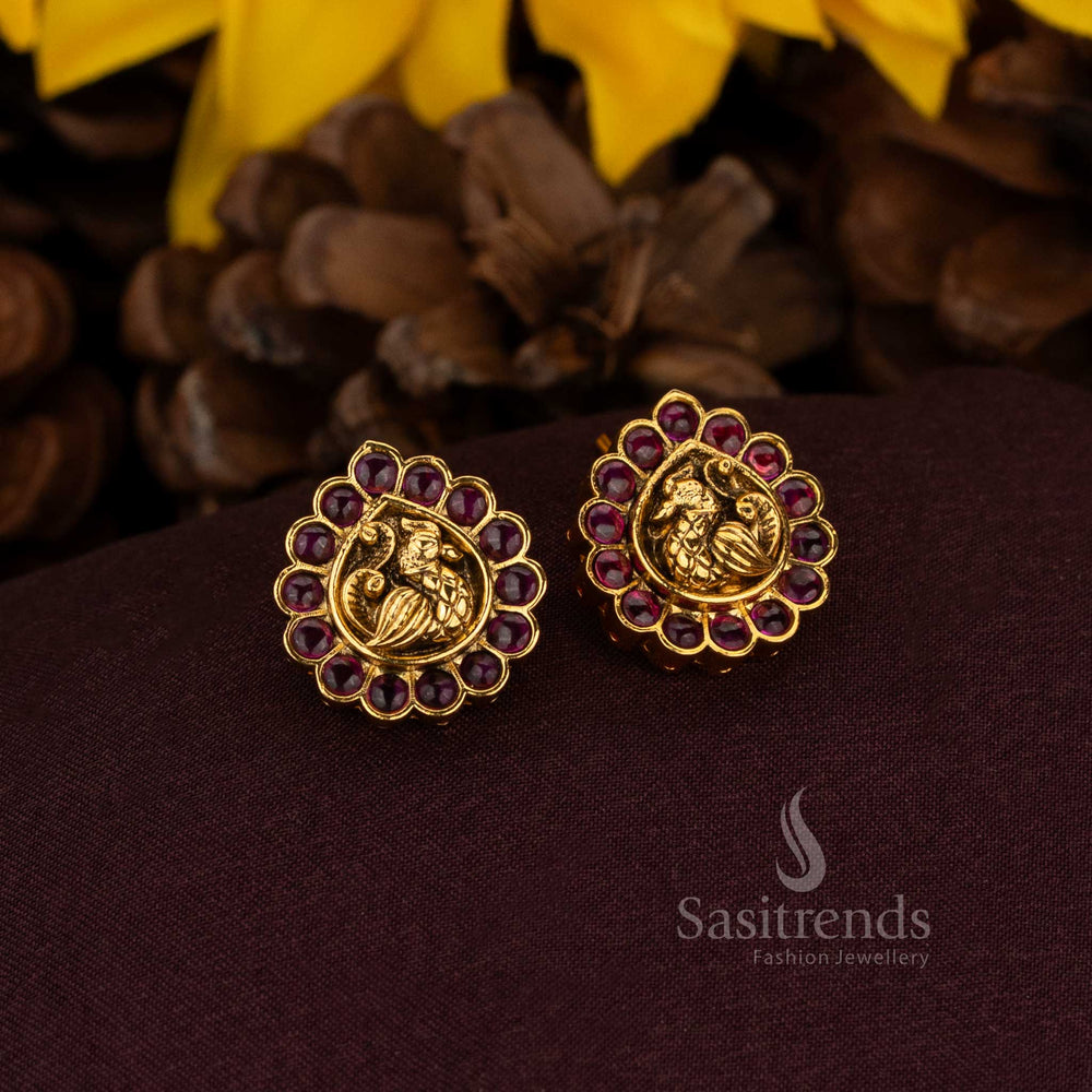 Splendid ruby peacock earrings crafted with AD artistry and heritage matte gold finish ideal for noble weddings and grand cultural jewellery – Sasitrends