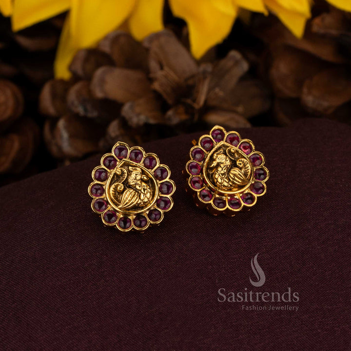 Splendid ruby peacock earrings crafted with AD artistry and heritage matte gold finish ideal for noble weddings and grand cultural jewellery – Sasitrends