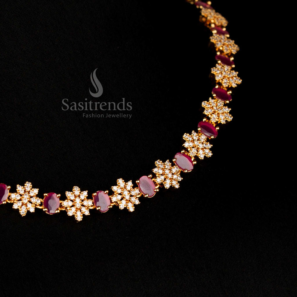 Radiant dual-tone micro gold American Diamond floral vine necklace adorned with ruby and white oval stones, creating a classic wedding statement of luxury – Sasitrends