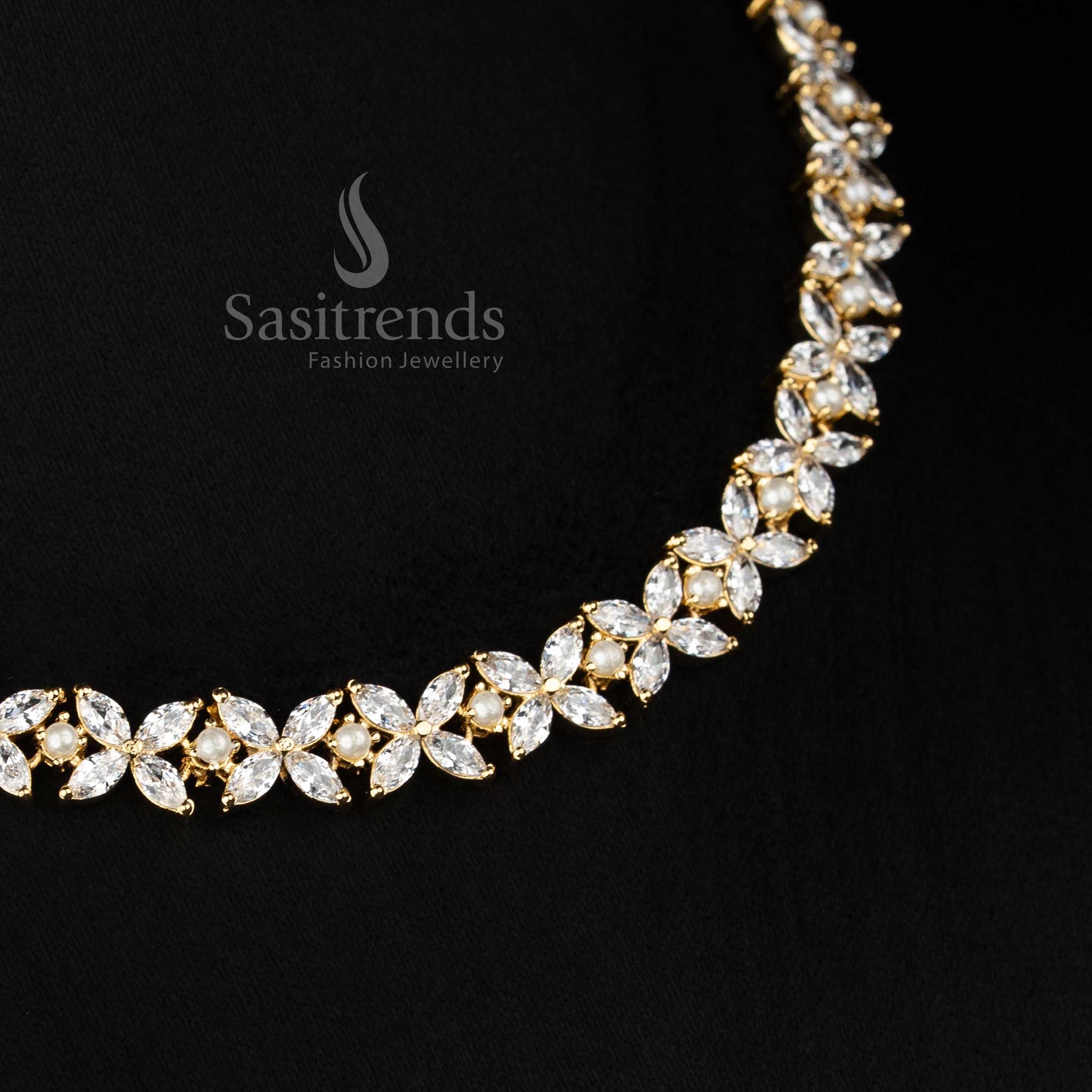 Radiant micro gold plated white four petal AD floral Necklace with pearls perfect for ethnic occasions and social gatherings -Sasitrends