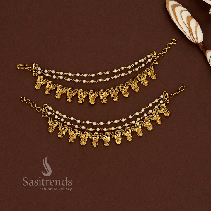 Heirloom style Lakshmi design temple matte gold plated American diamond matil ear chains featuring ruby-green stone combination and delicate pearl touches for wedding rituals - Sasitrends