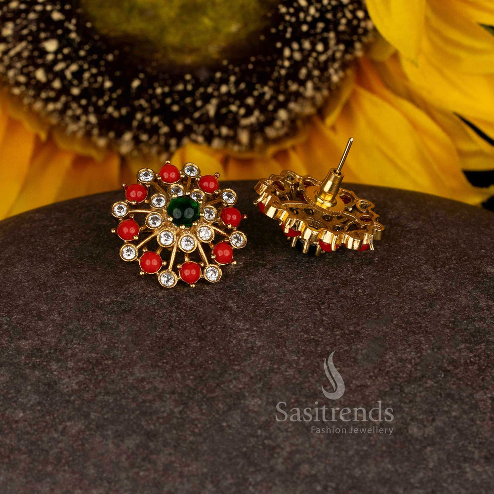 Ornate sunlit blossom matte gold plated temple floral sunburst stud earrings with multi stone and pavalam highlights adding traditional charm - Sasitrends
