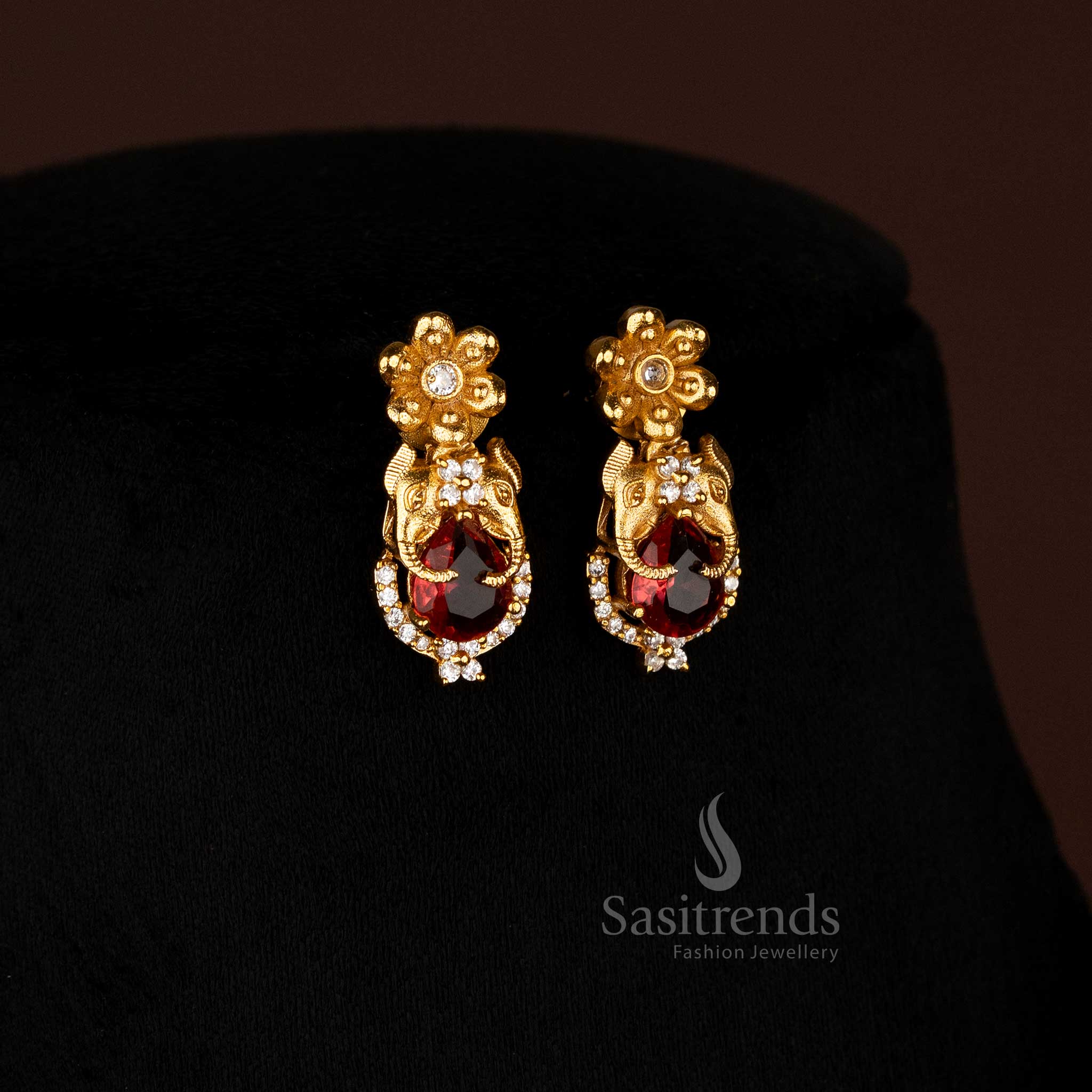Regal Temple Matte Gold Plated Elephant Earrings Red Stone Jewellery Designed For Bridal And Traditional Wear By Sasitrends