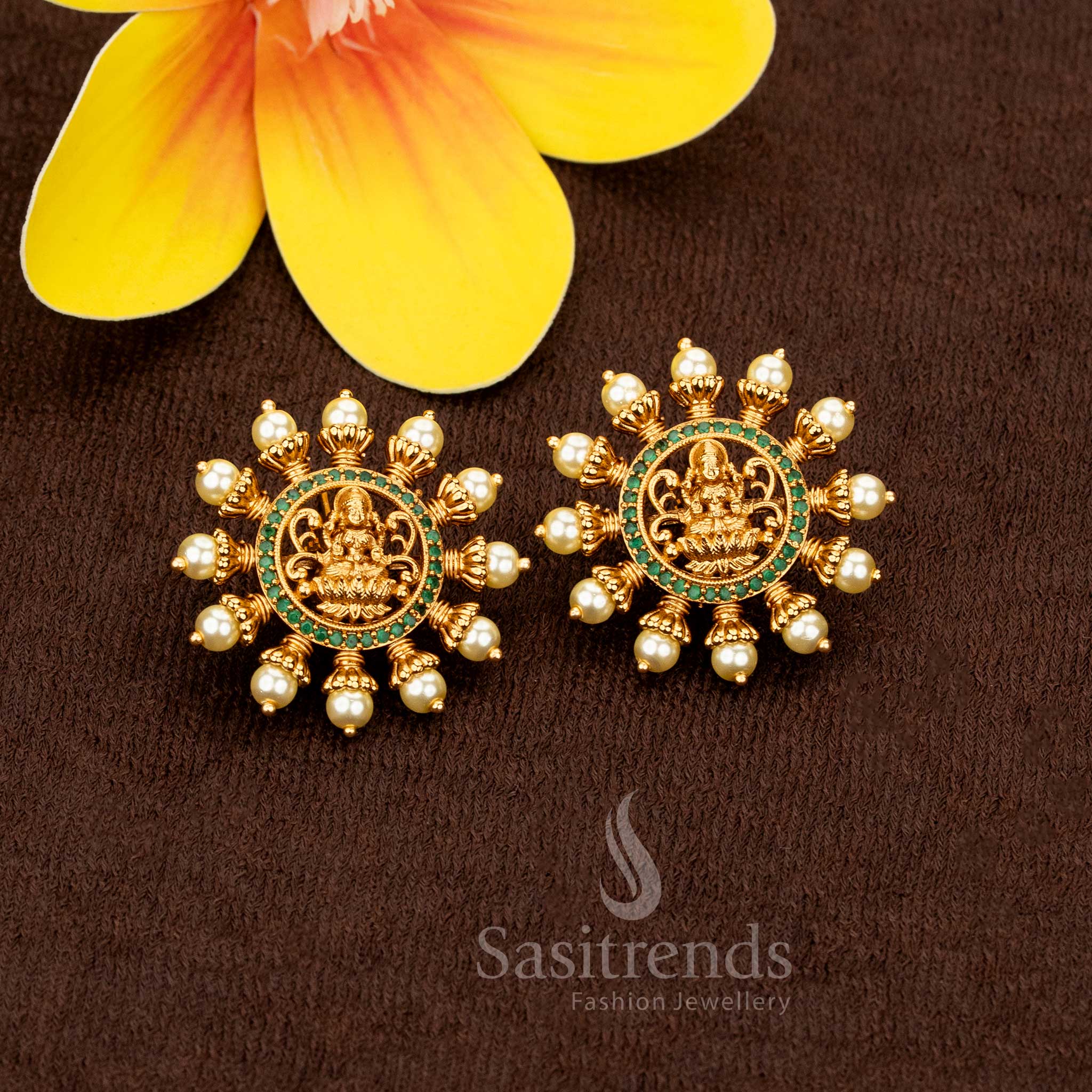 Vibrant green matte gold plated Lakshmi motif pearl stud earrings, perfect for temple festivities and ethnic bridal ensembles – Sasitrends