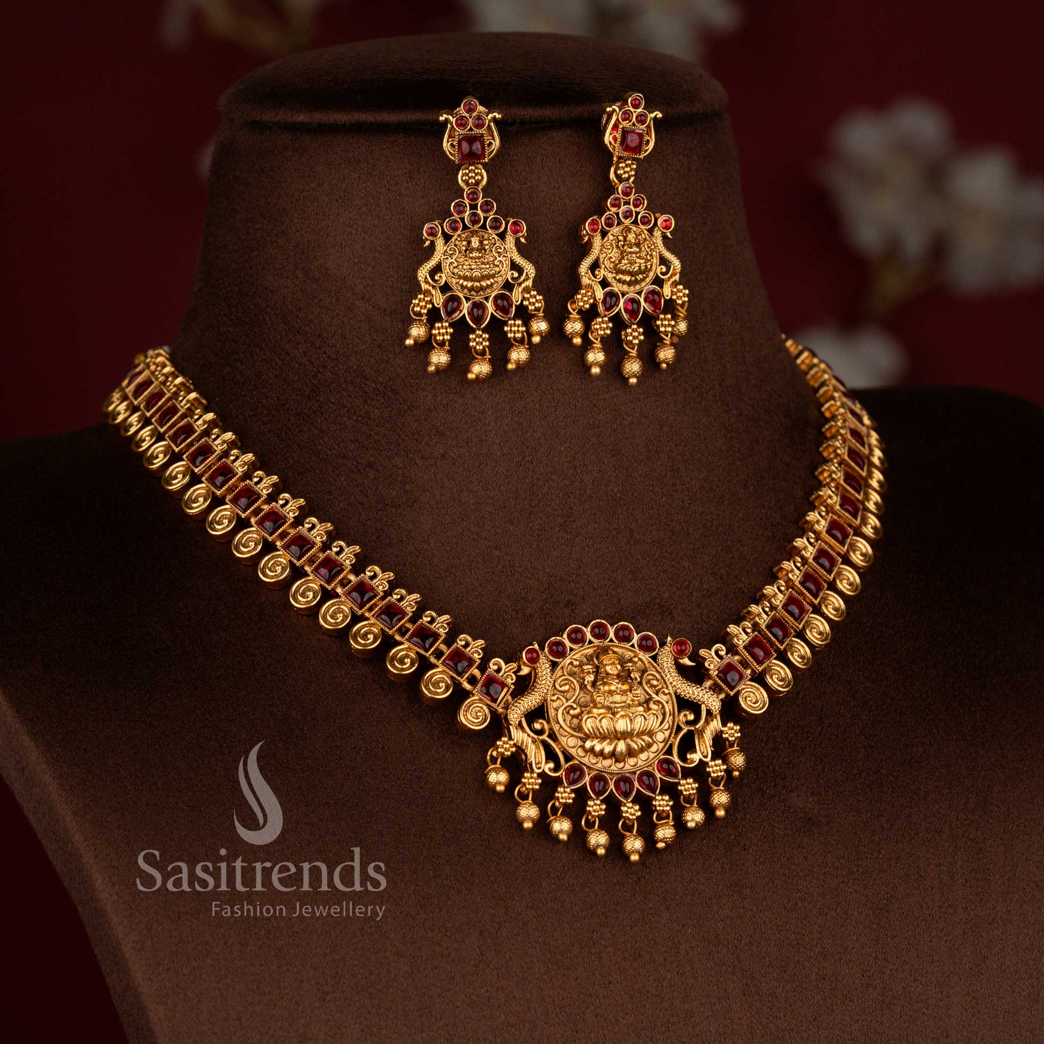 Regal matte gold square link peacock Lakshmi necklace set with ghungroo drops in ruby shade ideal for muhurtham and grand festive occasions – Sasitrends