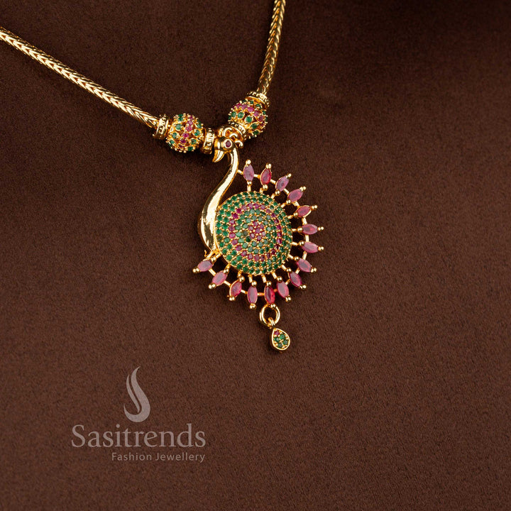 Regal micro gold plated peacock necklace in ruby-green tones featuring intricate gemstone detailing and pearl accents for festive or bridal wear – Sasitrends