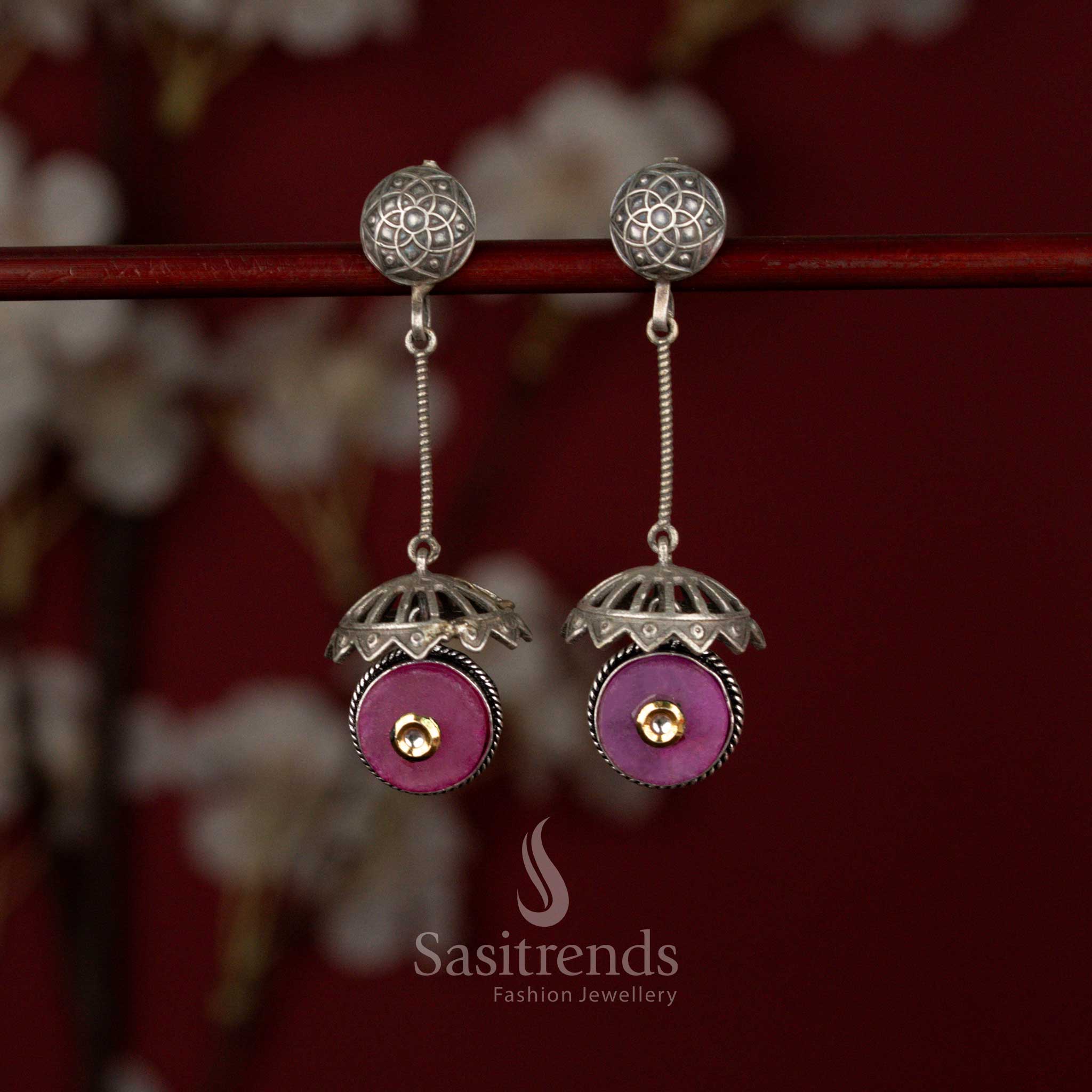 Graceful oxidised drop earrings designed with rod frame, dome base and magenta accent ideal for festive wear – Sasitrends