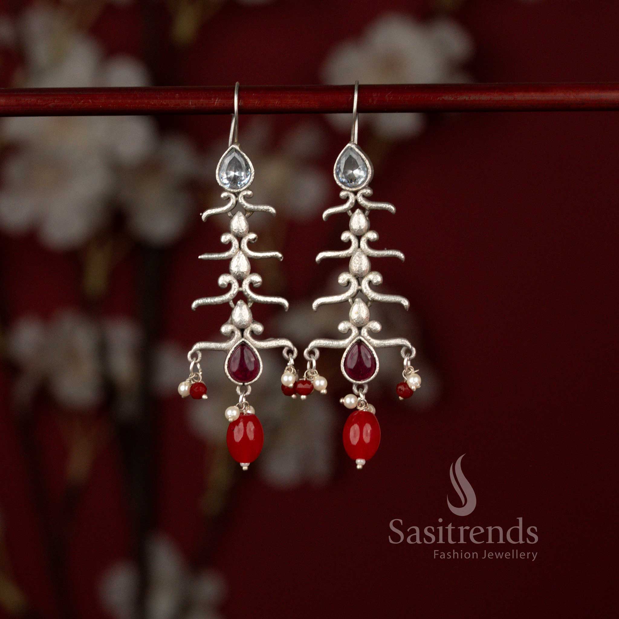 Regal oxidised silver plated earrings featuring flowing branch design, white ruby stones and pearl drops perfect for festival wear – Sasitrends