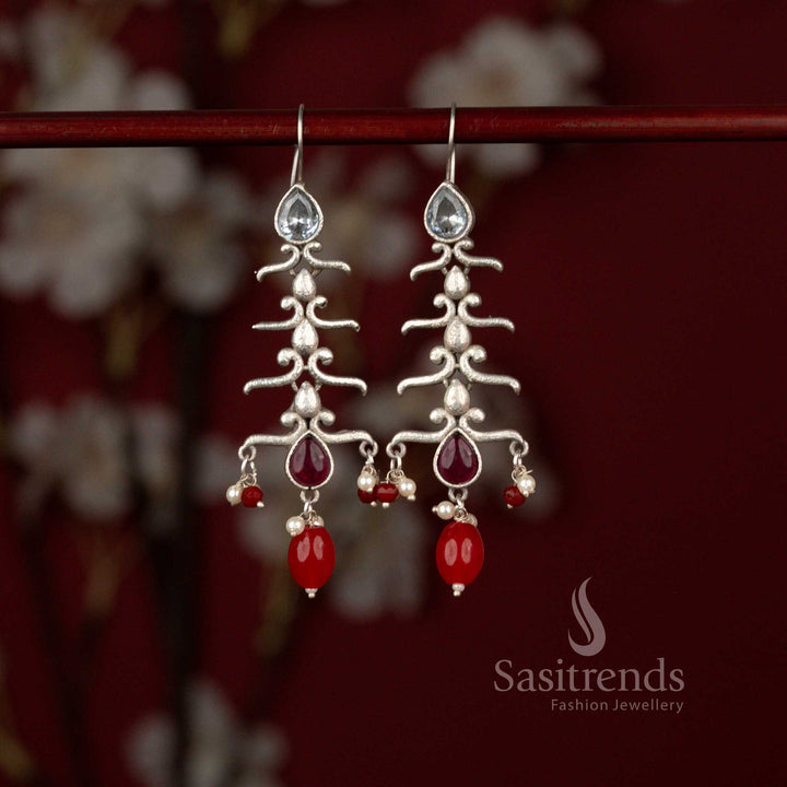 Regal oxidised silver plated earrings featuring flowing branch design, white ruby stones and pearl drops perfect for festival wear – Sasitrends