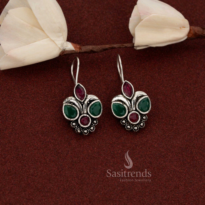 Opulent oxidised triple bloom drop earrings with ruby green stones suited for weekend gatherings and outings – Sasitrends