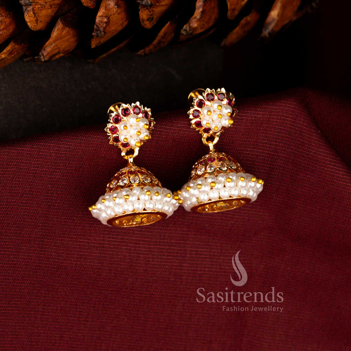Opulent ceremonial earrings in white-ruby highlighting luminous AD embellishments, rich pearl detailing and artistic dome drop craftsmanship – Sasitrends
