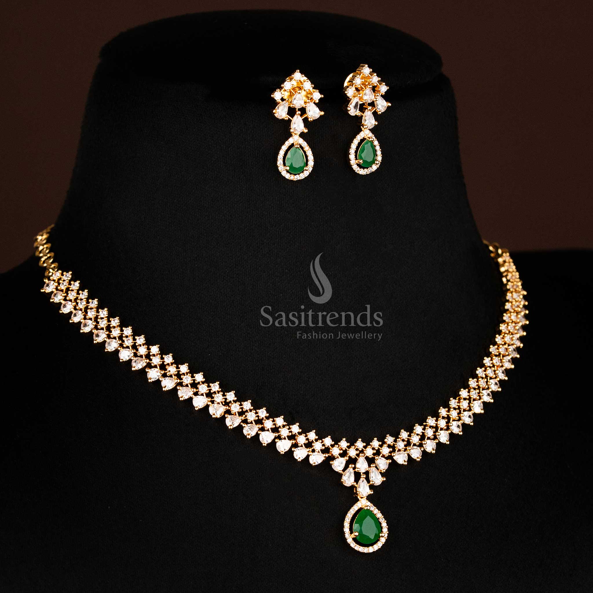 Elegant multi-chain white and green AD necklace featuring  Marquise Shape Stone teardrop design and ornate gold touches, festive jewellery by sasitrends