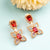 Stunning Rose Gold Plated Red Earrings with American Diamond Stones