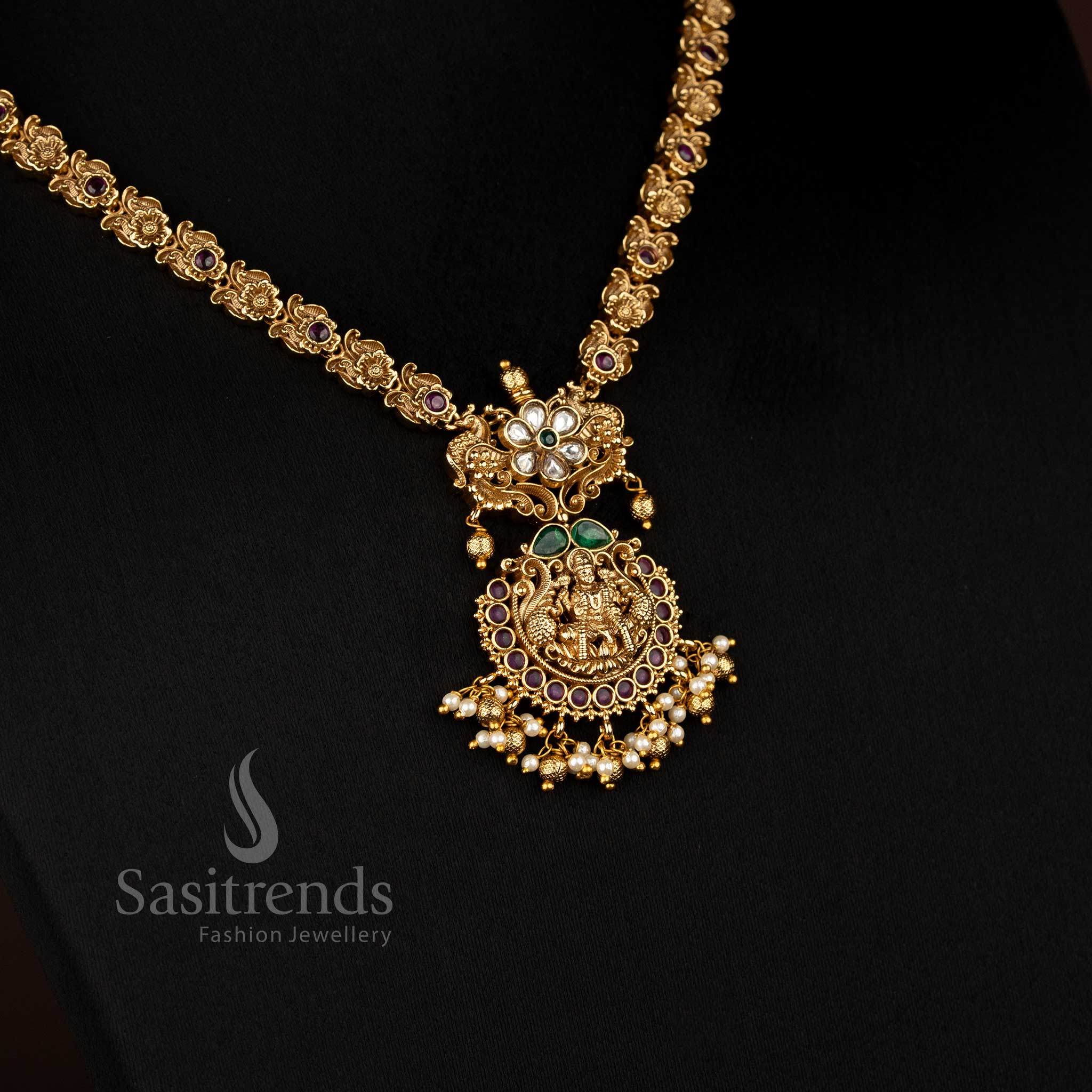 Exquisite Matte Gold Plated Multi Color AD Peacock Floral Necklace with Lakshmi Pendant, Designed for Grand Festive and Traditional Jewellery Looks – Sasitrends