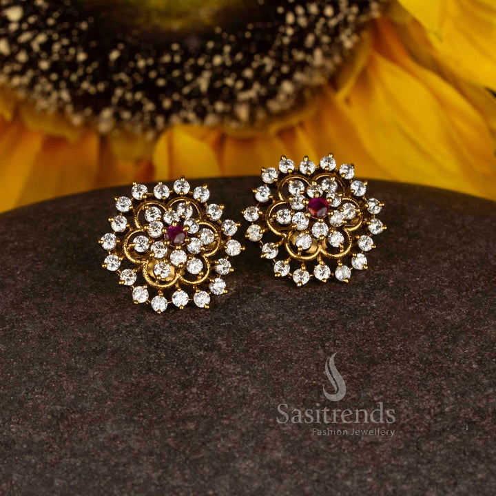 Delicate ethereal bloom matte gold plated temple circular floral stud earrings with white-ruby accents showcasing traditional artistry - Sasitrends