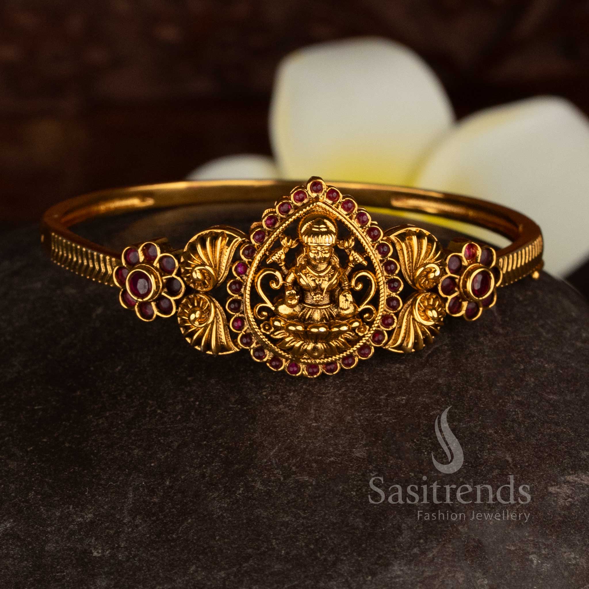Sacred radiance matte gold plated Lakshmi floral teardrop AD ruby openable kada with heritage glow jewellery - Sasitrends