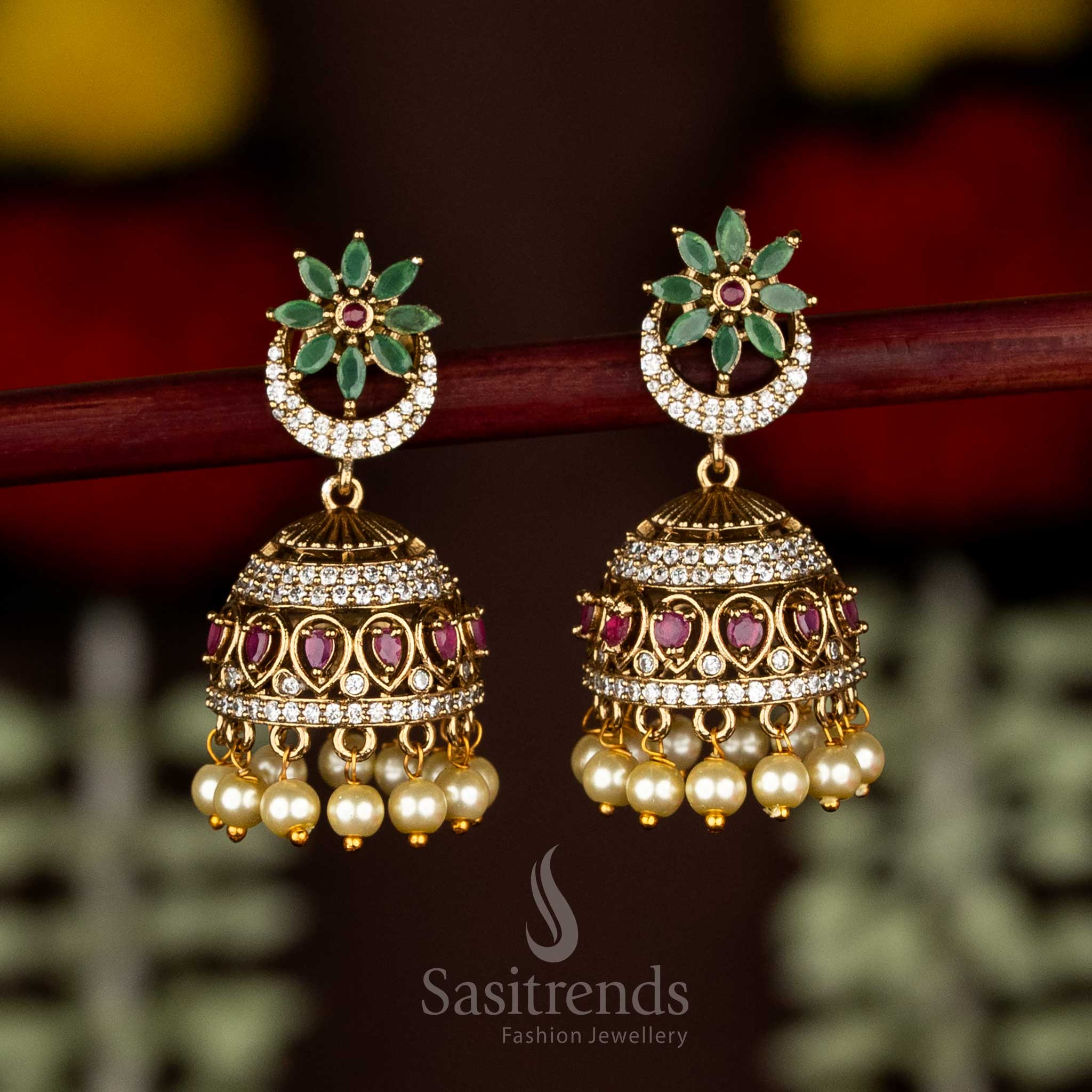 Radiant matte gold plated multi AD floral crescent dome jhumka earrings with pearl drops – Sasitrends