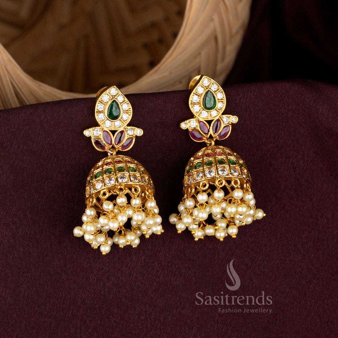 Celestial paisley leaf teardrop jhumka earrings styled with noble matte gold finish, splendid AD brilliance, eternal pearl danglers, and grandiose artistry for bridal refinement – Sasitrends