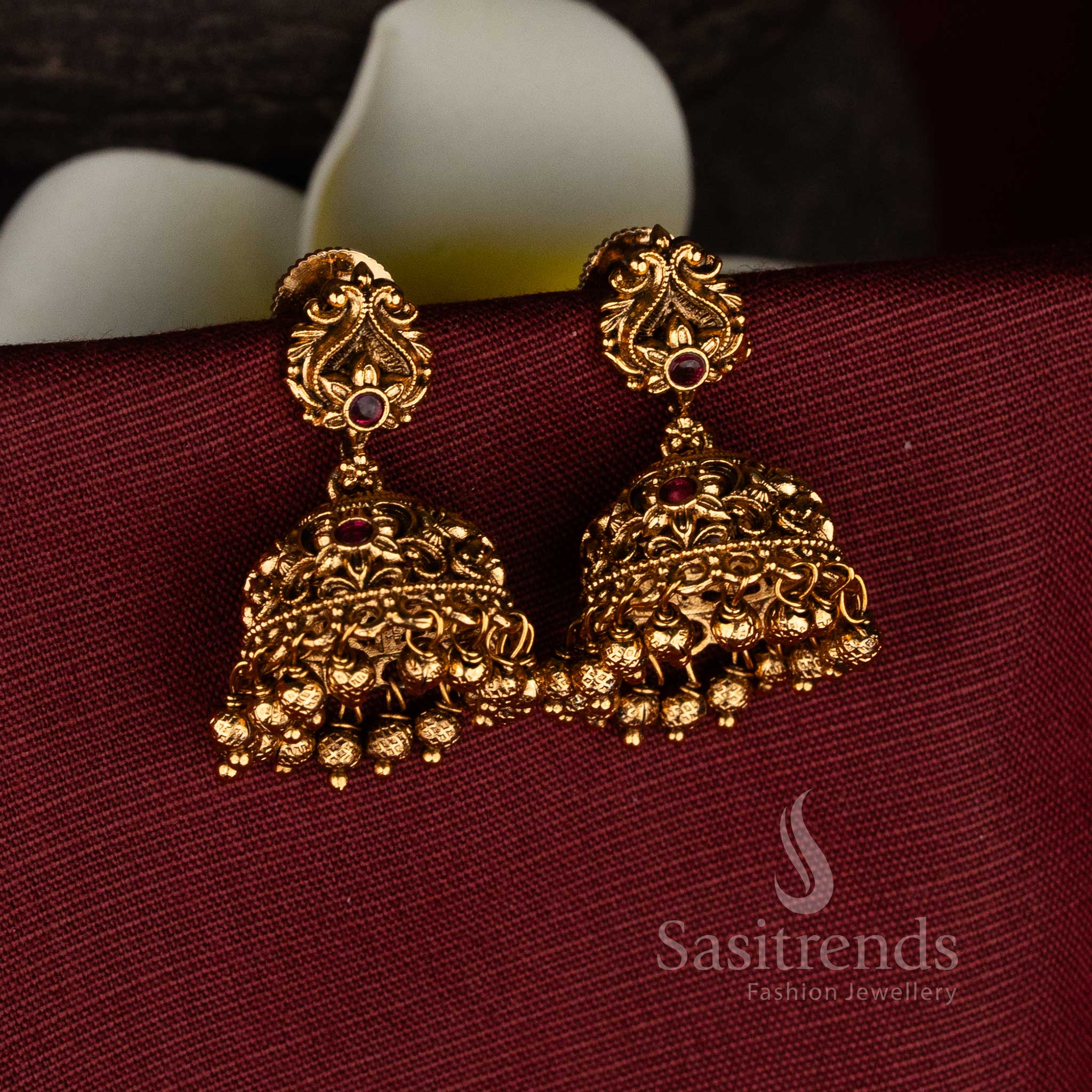 Divine heritage matte gold plated ruby peacock floral filigree jhumkas with golden ghungroo detailing for temple festive jewellery - Sasitrends