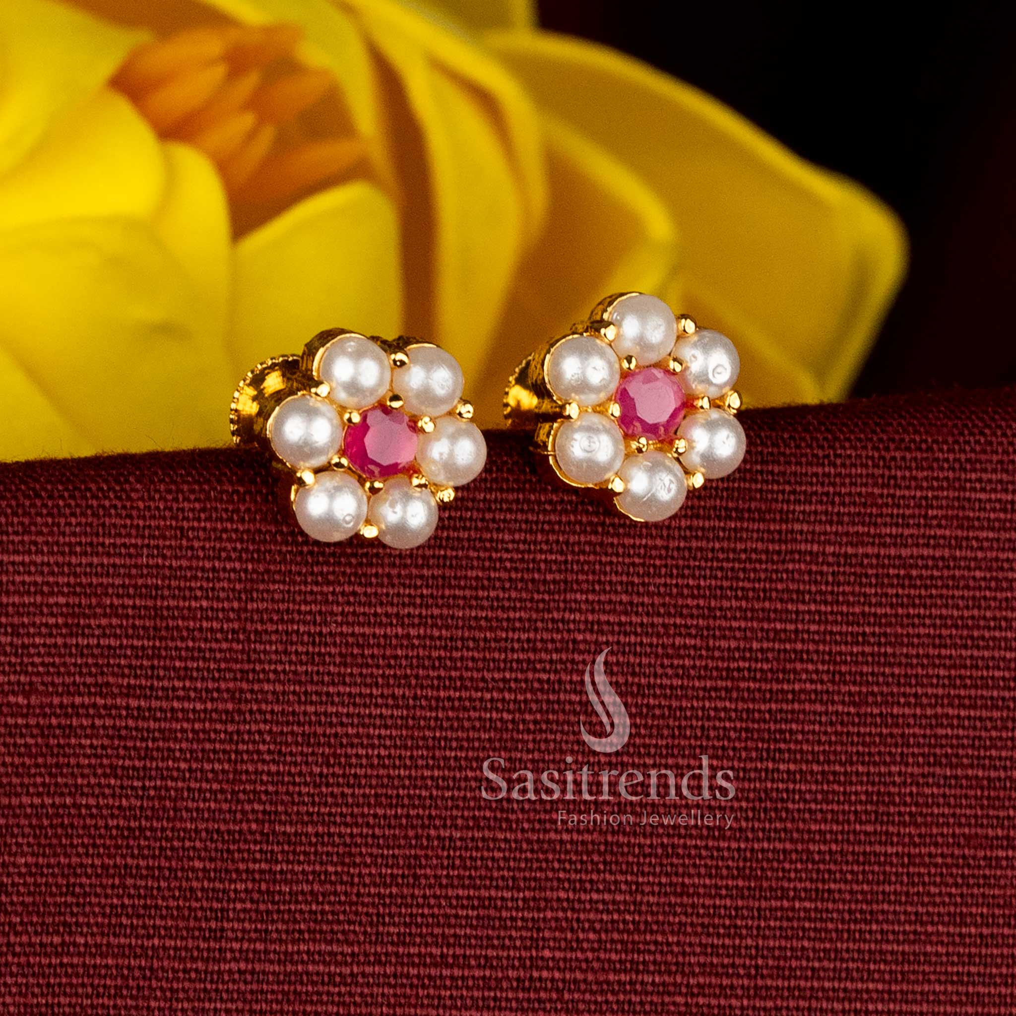 Refined AD floral stud earrings with a pearl–ruby blend, micro gold plated in a high-quality one gram finish ideal for sarees and festive ensembles – Sasitrends
