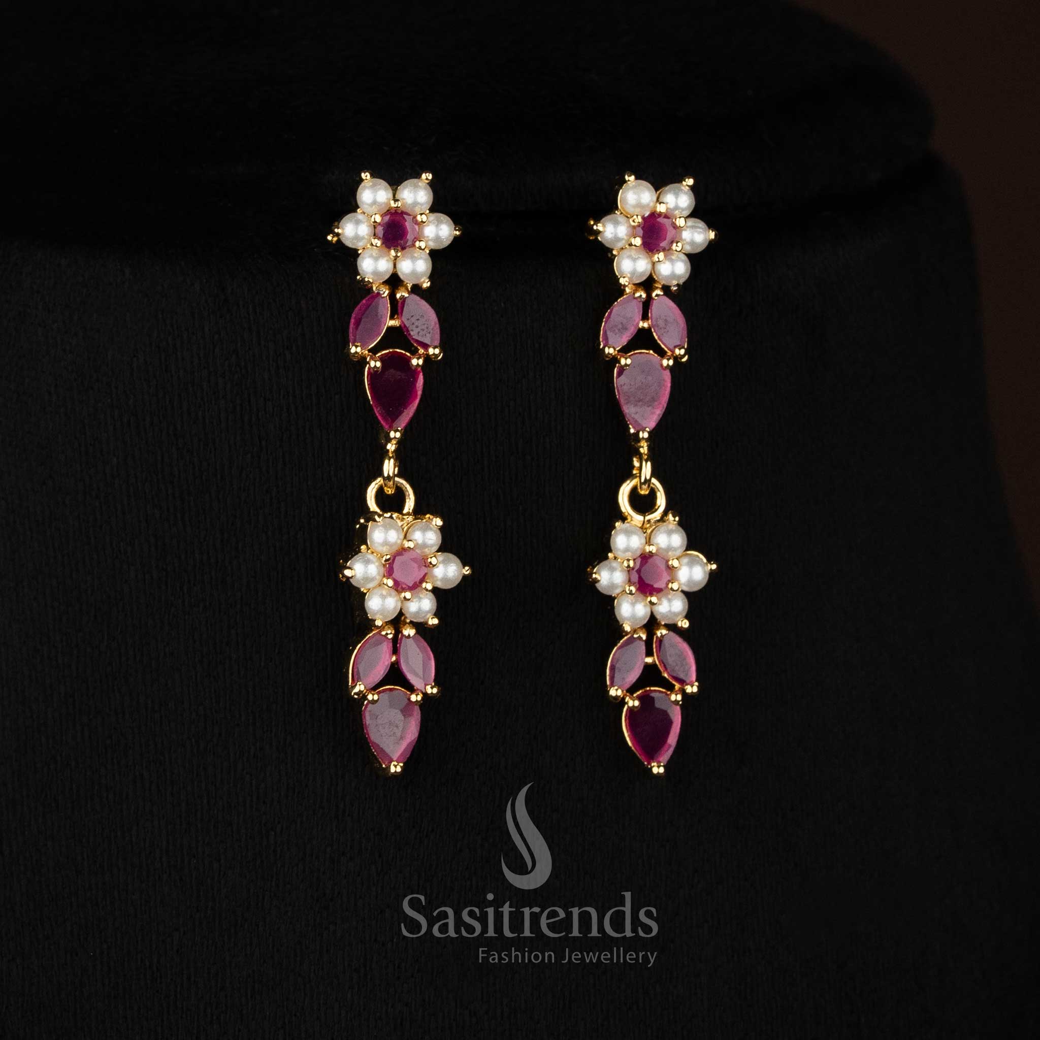 Inspired micro gold plated pearl ruby AD leaf floral teardrop earrings styled for evening celebrations - Sasitrends