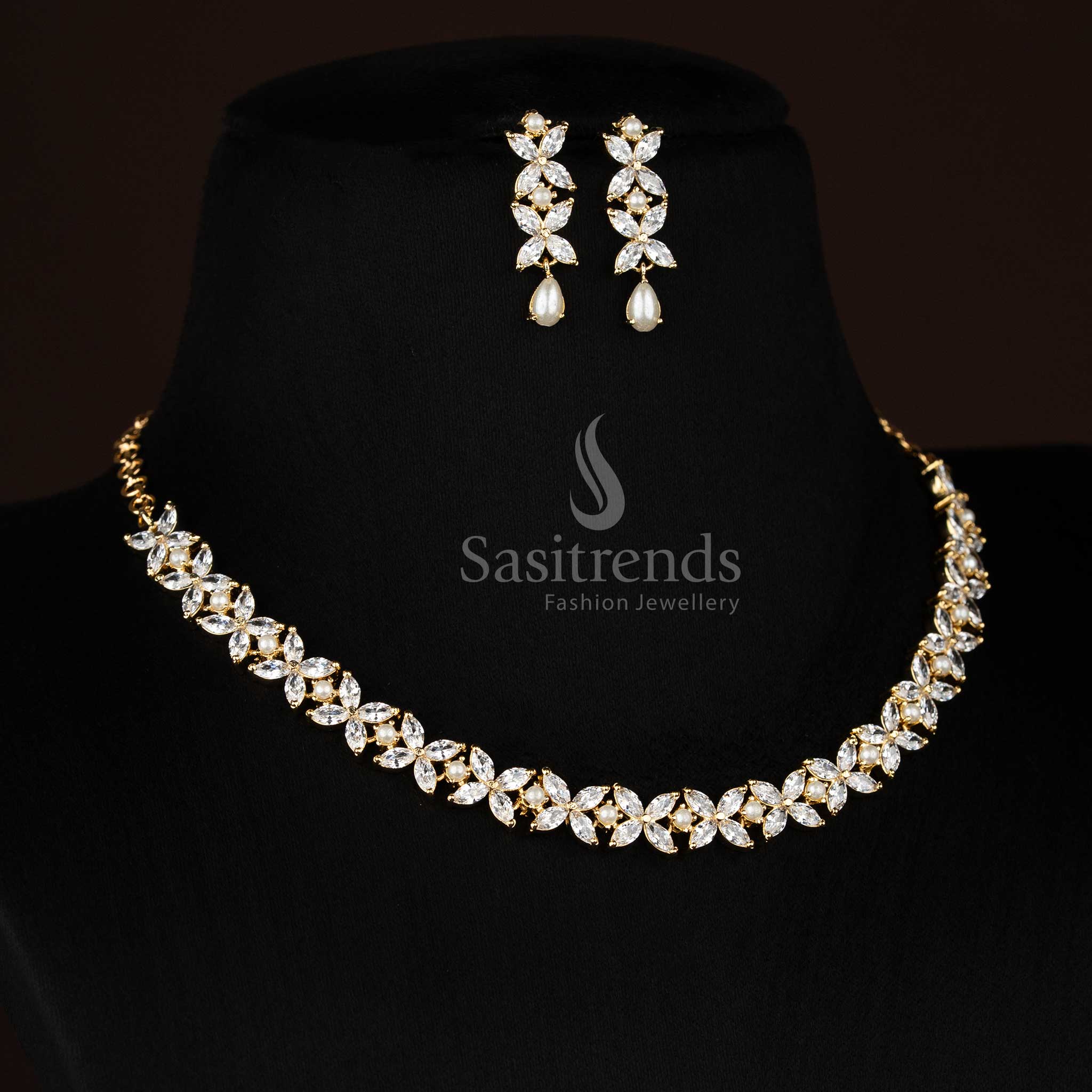 Majestic micro gold plated white four petal AD floral necklace set with pearls designed for elegant party styling and festive wear -Sasitrends